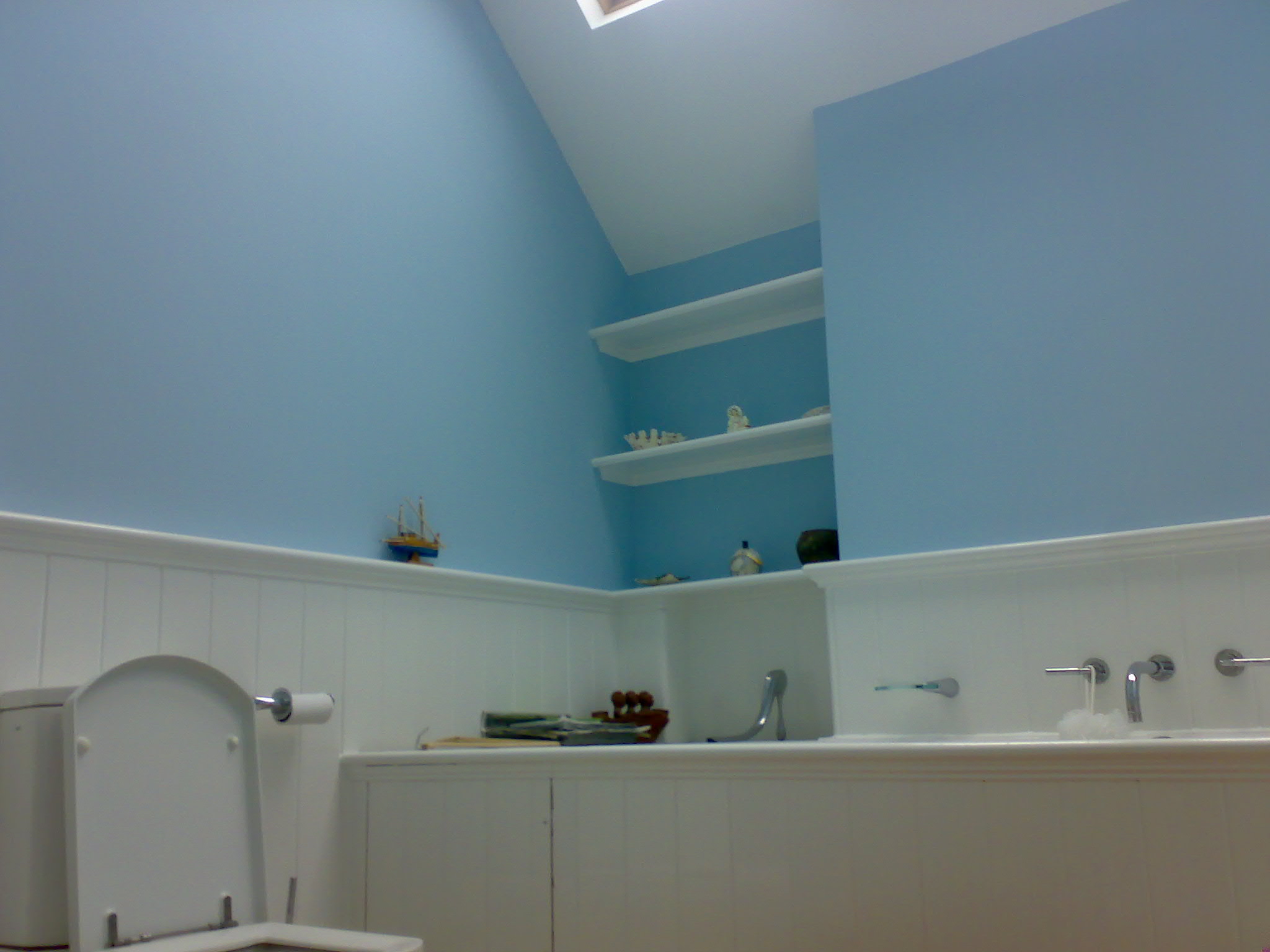 "Bathroom in Basildon, Essex with freshly painted walls and ceiling, showcasing a clean, bright, and modern look."