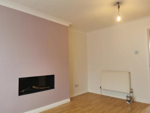 lounge-with-feature-wall-painted